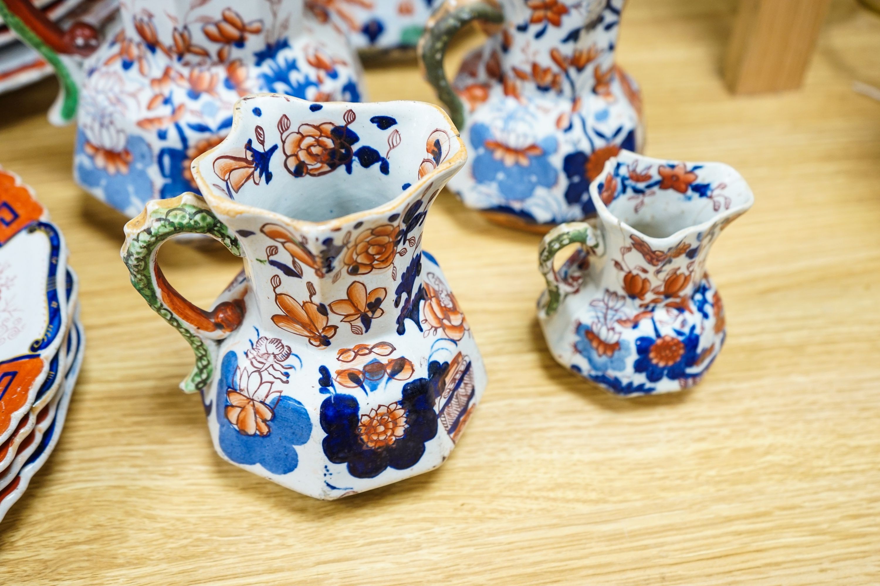 Five Masons ironstone jugs and a Masons ironstone part dinner service, to include a tureen and an oval dish